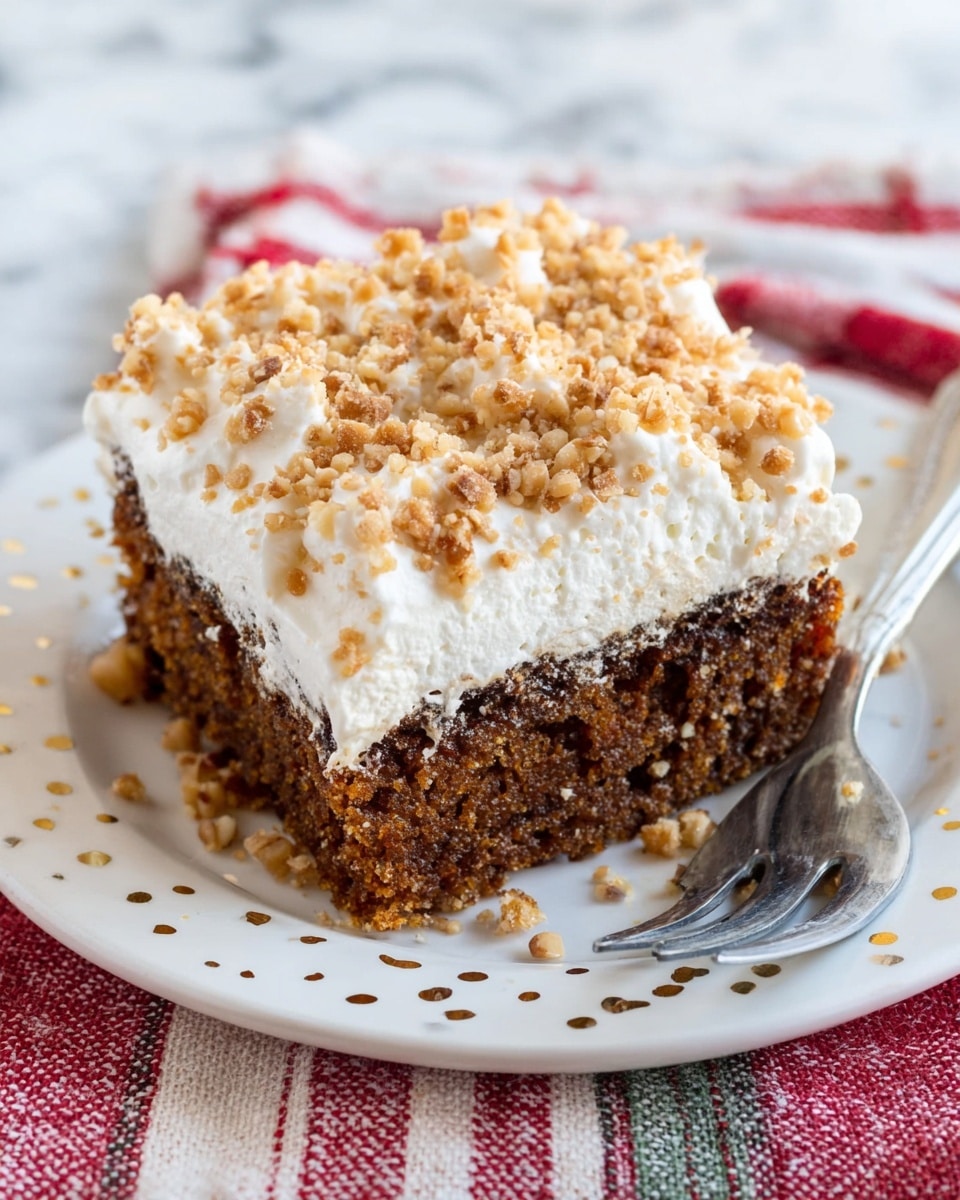A close-up image of a square piece of cake on a white plate with gold rim details, resting on a white marbled surface. The cake has three layers: a thick, moist brown base with a crumbly texture, a thick layer of smooth white cream in the middle, and a topping of small, chopped light brown nuts evenly spread on top. A silver fork is placed on the right side of the plate. Photo taken with an iphone --ar 4:5 --v 7