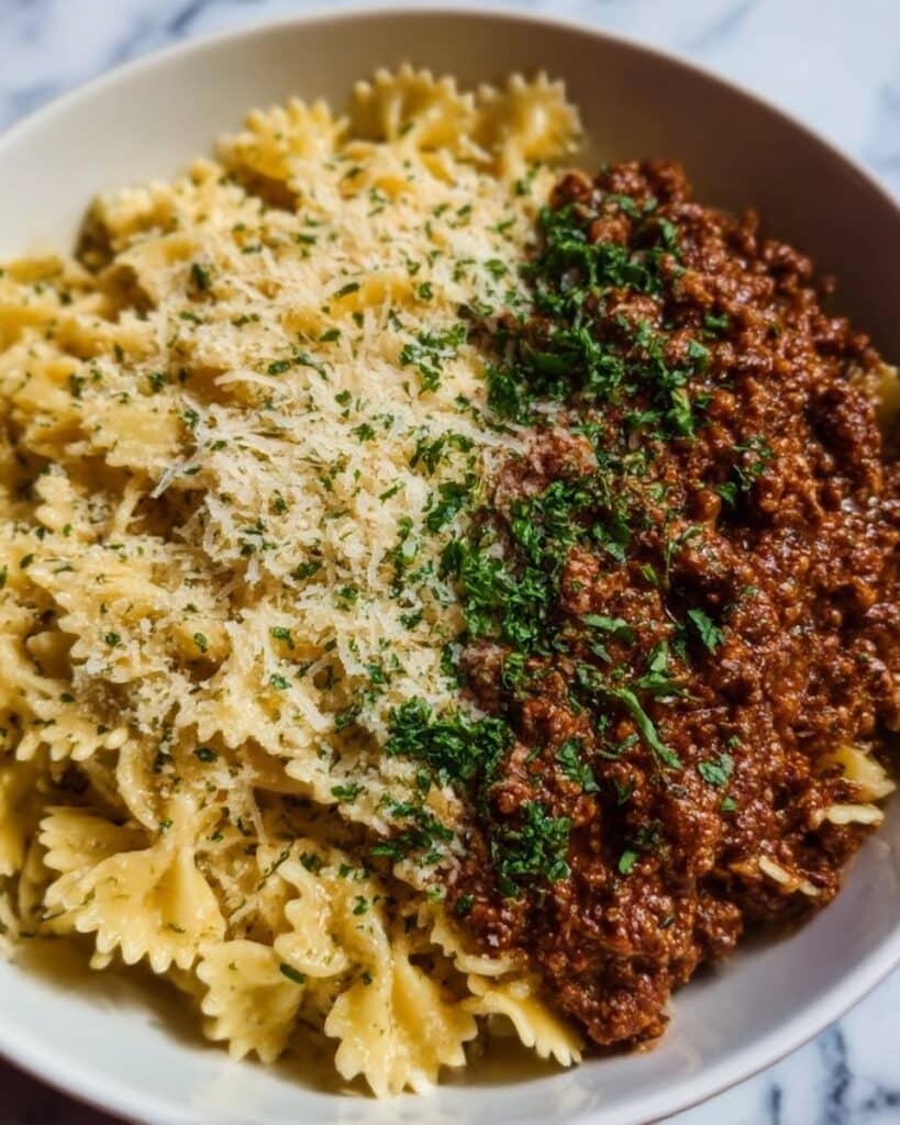 Cheesy Bowtie Pasta with Savory Cajun Ground Beef in Garlic Cream Recipe